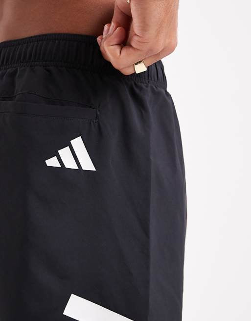 adidas Training 8"" 3 stripe swim shorts in black